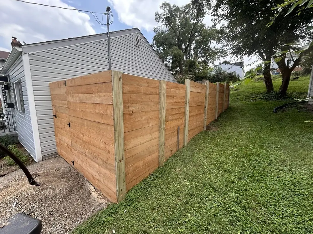Custom horizontal wood fence installed by Star City Fence Co